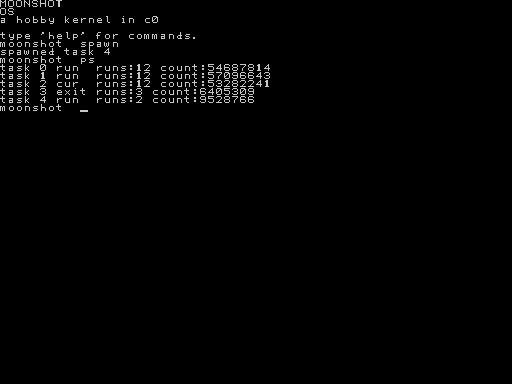 moonshot running under QEMU: the word MOONSHOT and a shell prompt drawn in moonshot's own font on a black framebuffer, with the output of the ps command listing running tasks.